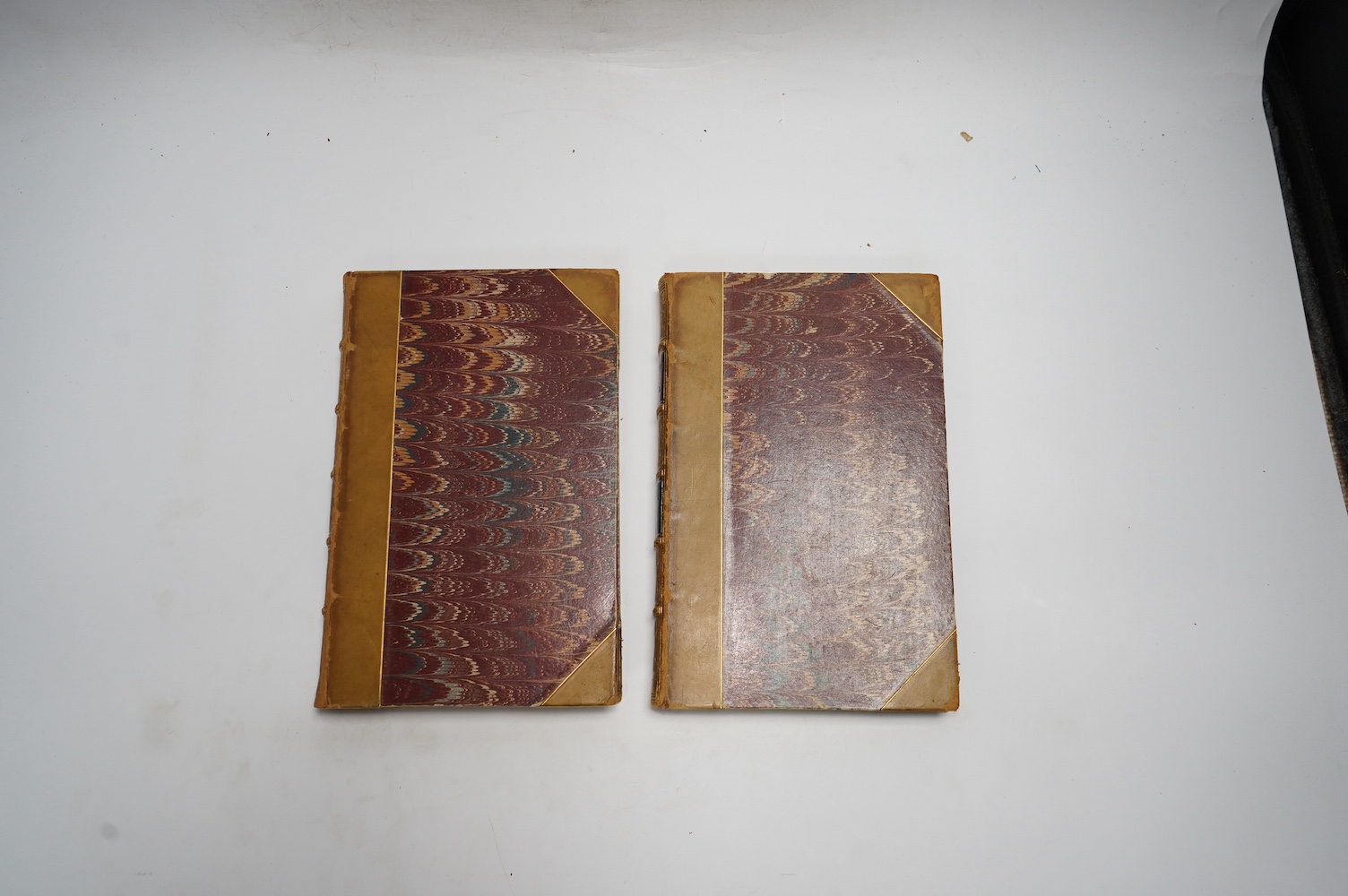 Thackeray, William Makepeace - Vanity Fair. A Novel Without a Hero. First Edition (bound as 2 vols.) engraved pictorial (vol.1) and printed (vol.2) titles, 39 plates and num. text engravings; contemp. gilt ruled half cal